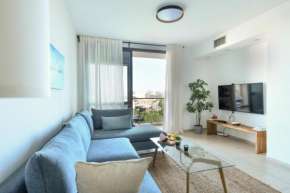 Vibrant 2BR apt with Mamad and Balcony 5-min from the Beach by Sea N' Rent
